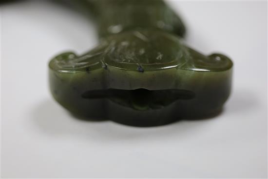 A Mughal spinach jade dagger handle, 5.75in.